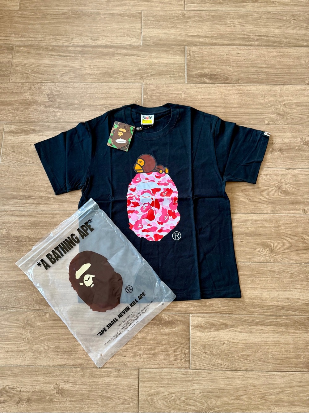 A Bathing Ape Black Tee with Pink Camo Ape Graphic